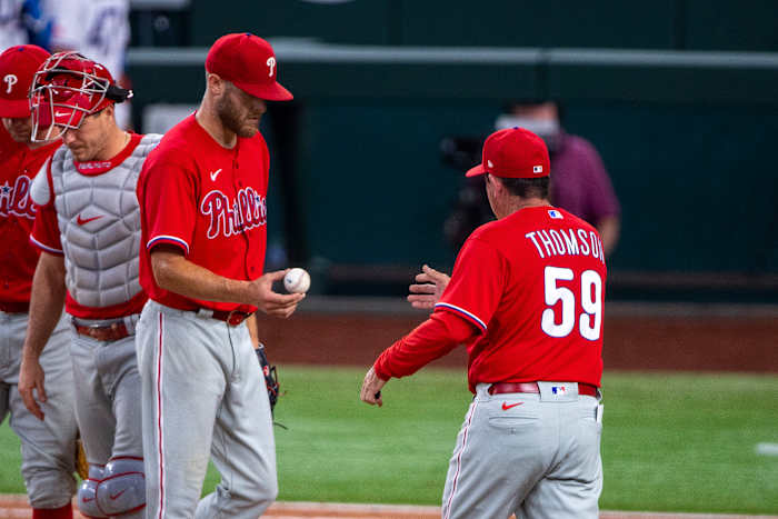 Rob Thomson relieves Zack Wheeler from his duties on Wednesday against the Texas Rangers.
